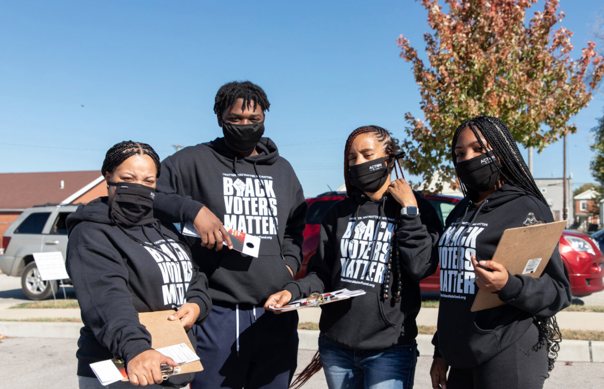 Image of masked organizers in Black Voters Matter sweatshirts. (Source: Action STL)